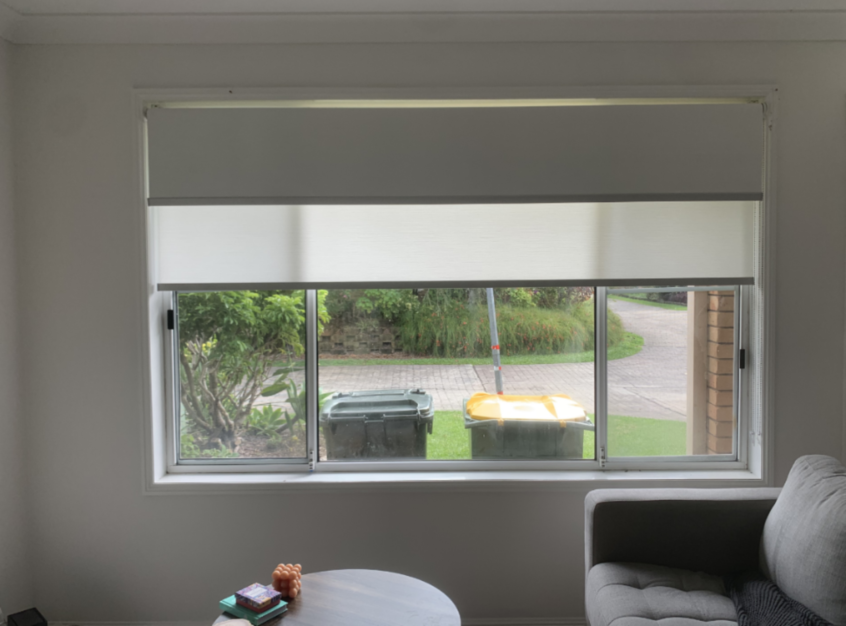 Double roller blinds installed in living room