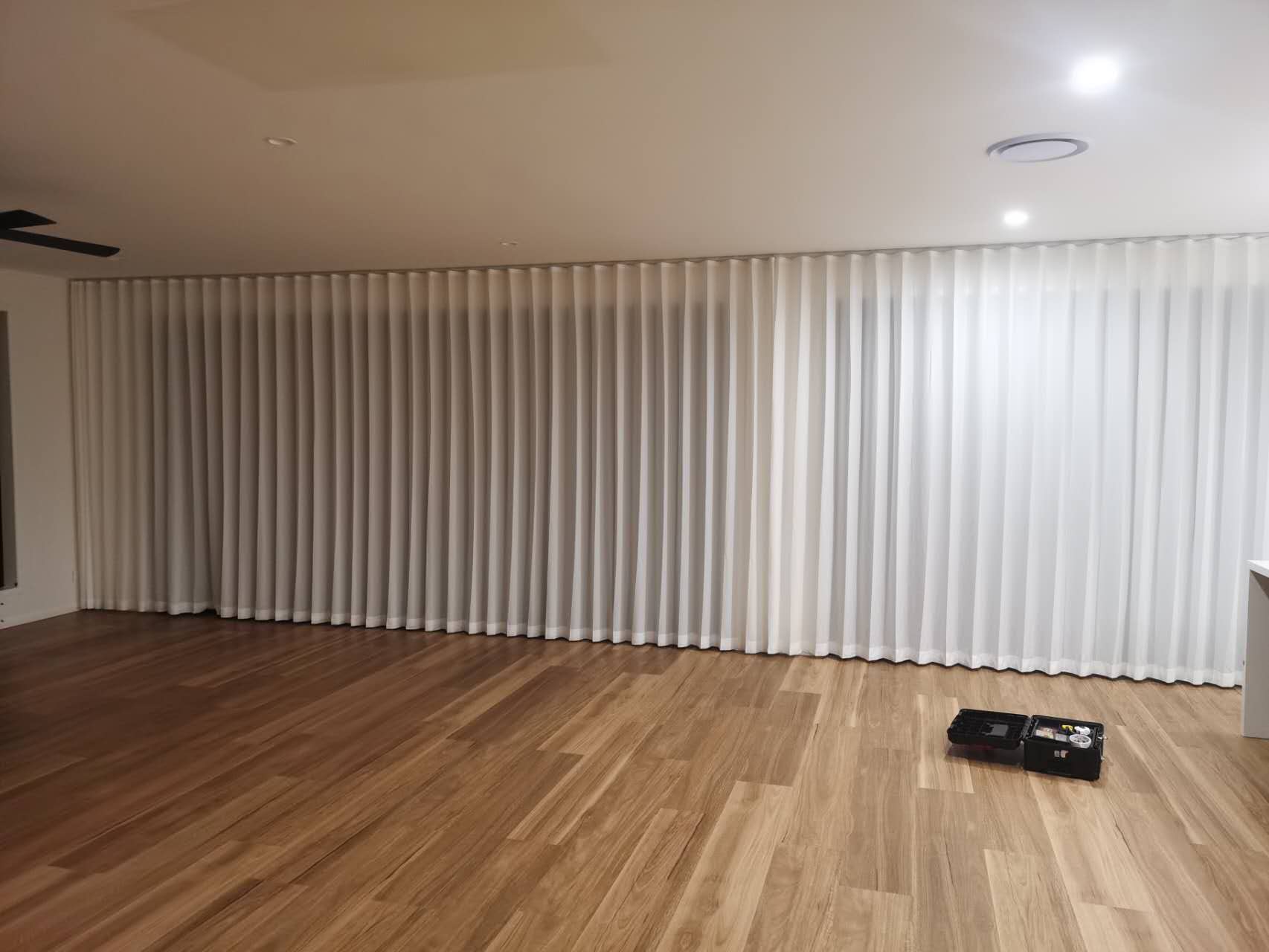 S-Fold privacy sheer installed for living area large window and sliding door