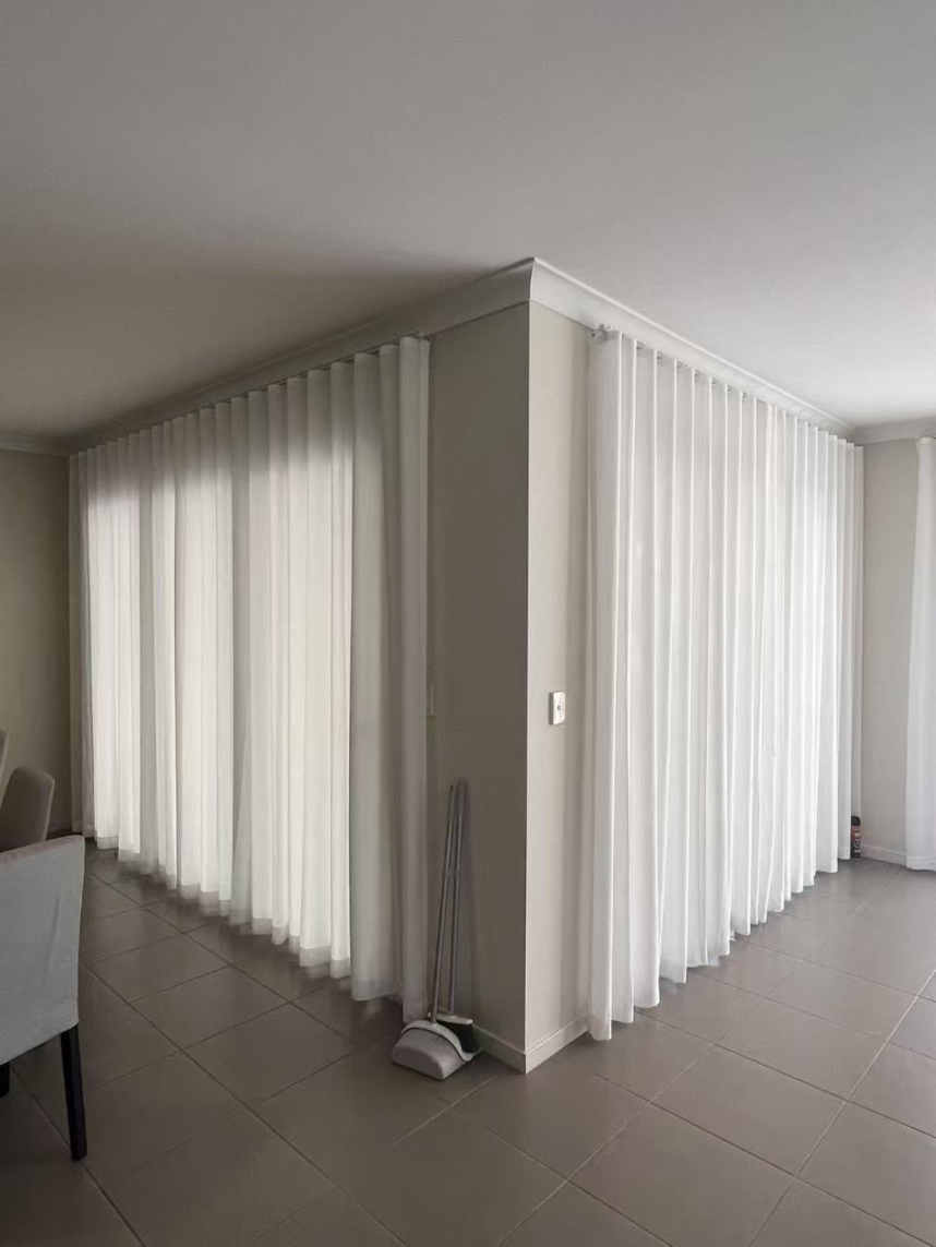 S-Fold privacy sheers installed for two sliding door in living