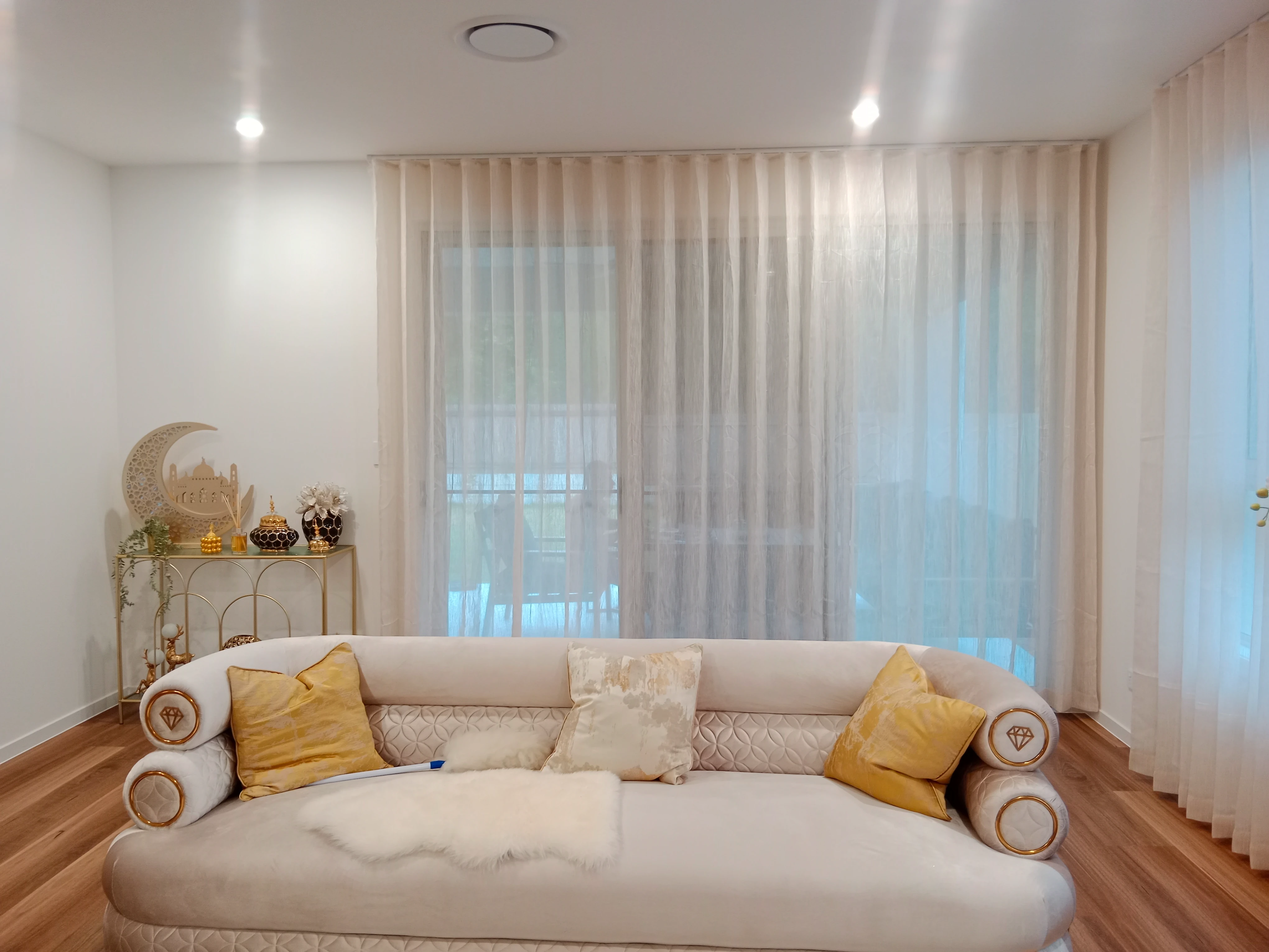 S-Fold transparent sheer installed for one large window in living room