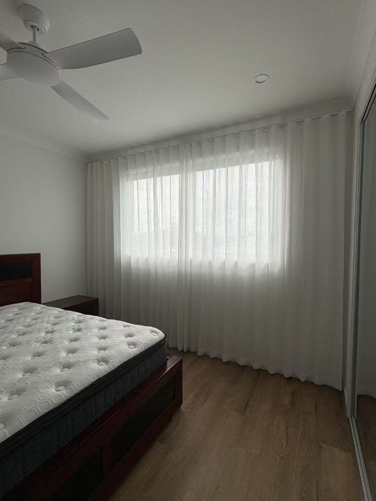 S-Fold transparent sheer installed full wall size for one window in bedroom