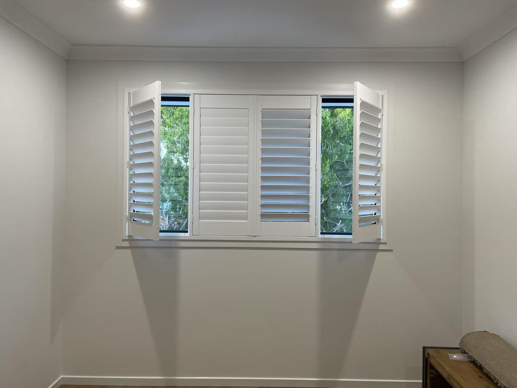 PVC plantation shutters installed in one window