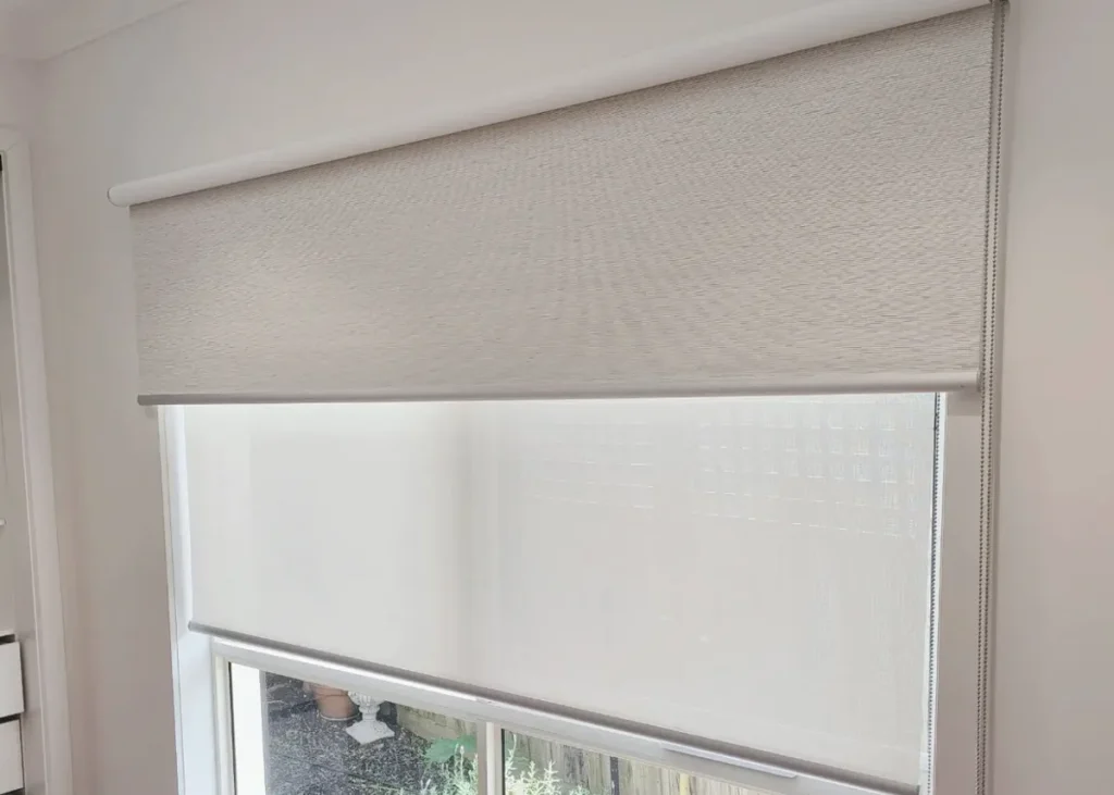 Blockout roller blind with side channels sealing the window edges